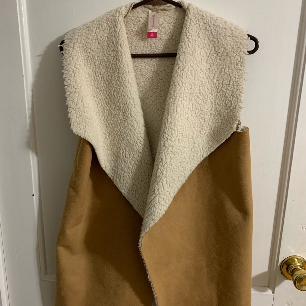 Women’s sherpa-suede vest lightweight. Gently used, worn only a couple times.